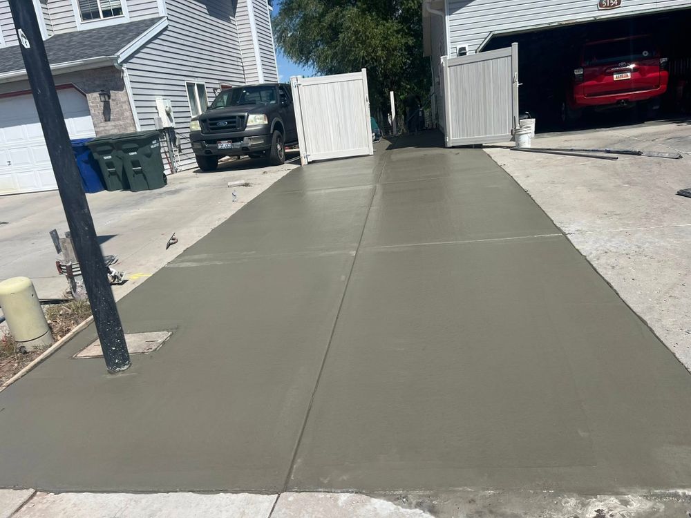 Explore our professional concrete services, offering durable driveways, patios, and walkways designed to enhance your home's value and style. Trust our skilled team for quality craftsmanship and reliable installation. for Feiloaki Construction LLC in Farmington, UT