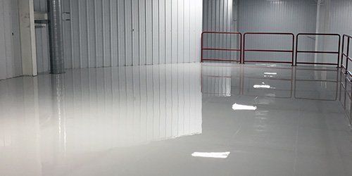 Our Epoxy Flooring service offers a durable and attractive solution for homeowners looking to enhance the longevity and appearance of their floors while providing easy maintenance. for Red Maple Painting in Plattsburgh, NY