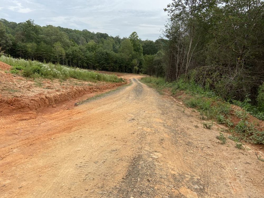 Transform your property with our comprehensive Driveway Construction service, expertly clearing land to create a smooth, durable driveway that enhances accessibility and adds value to your home. for WNC Tree Works LLC in Murphy,  North Carolina