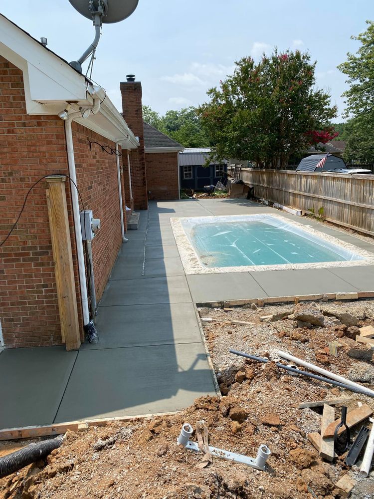 Our vinyl pools service offers homeowners a durable, cost-effective alternative to traditional concrete options, providing a smooth finish, design flexibility, and quick installation for your dream backyard oasis. for Henry's Construction in Nashville, TN
