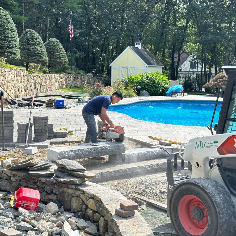 Transform your outdoor space into a relaxing oasis with our Pool Deck service. Enhance the beauty and functionality of your pool area with high-quality materials and expert craftsmanship. for J&R Visual Landscaping Inc in Haverhill, MA