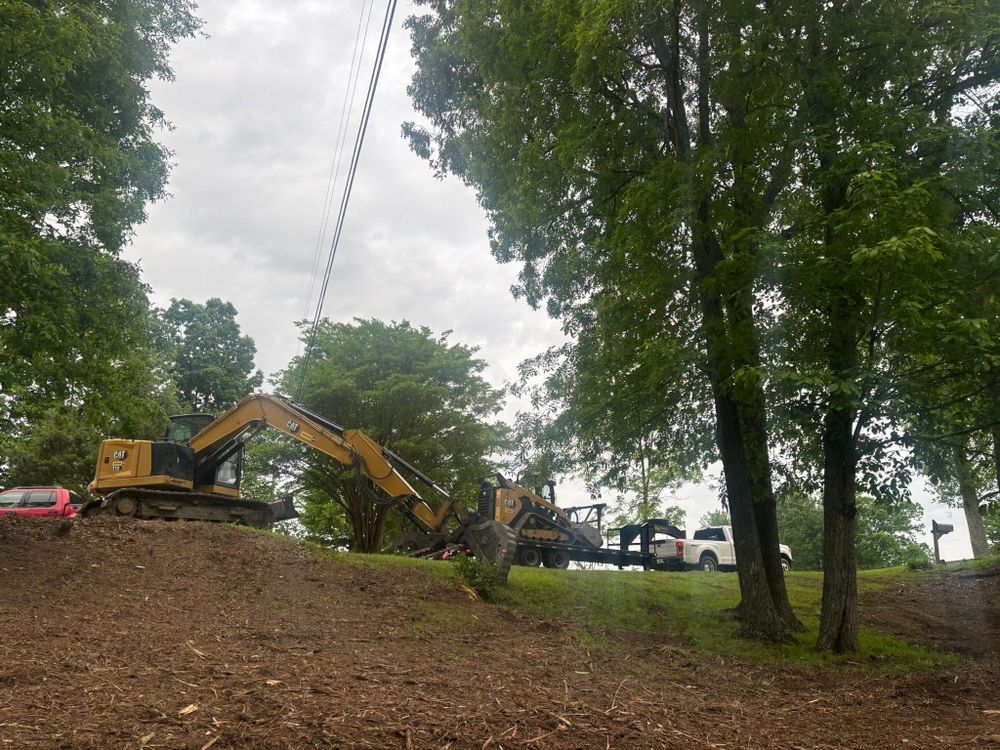 Our Residential & Commercial Excavation service offers precise and reliable site preparation, foundation digging, and land clearing to ensure your project starts with a strong, safe groundwork by our expert team. for Mountain Land Services LLC. in Oneida, TN