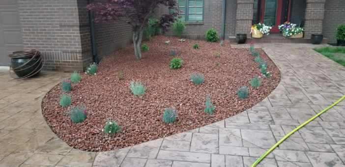 Our Mulch Installation service adds aesthetic appeal, conserves soil moisture, controls weeds, and protects plant roots. Let us revamp your landscaping with our expert mulching solutions for a lush garden. for Raccoon Valley Lawn Care in Des Moines, IA