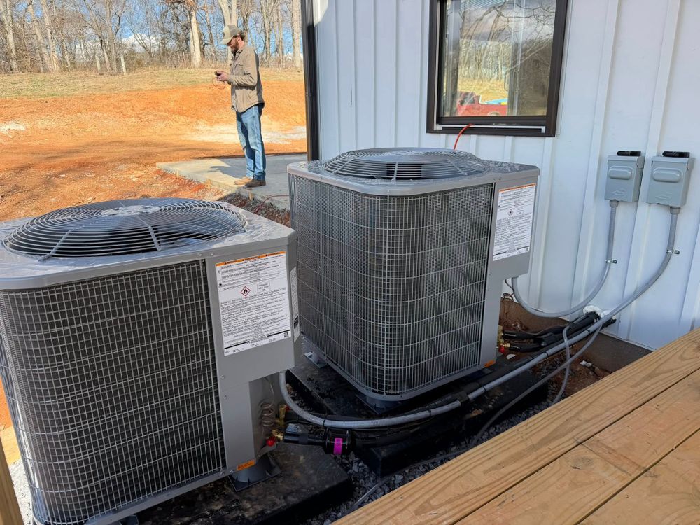 Our Residential HVAC Installation service ensures efficient and reliable climate control for your home, with expert technicians providing customized solutions that enhance comfort, energy efficiency, and overall system performance. for Biddinger Heating & Cooling in Church Hill, TN
