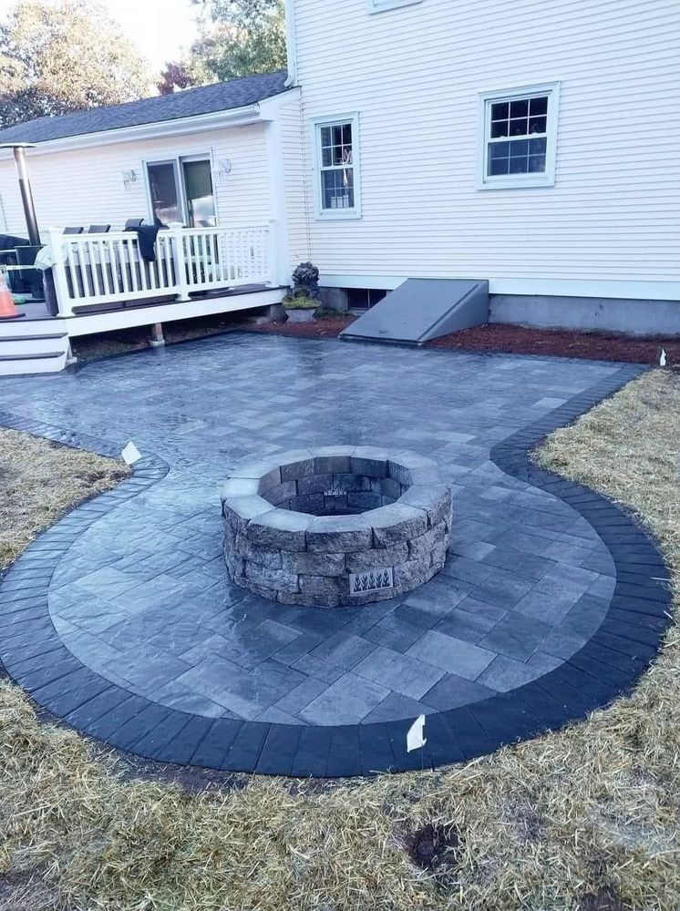 Enhance your outdoor living space with our expert Patio Design & Construction service, offering custom solutions that blend beauty and functionality to create the perfect alfresco retreat tailored to your home. for Elite Pavers and Fencing in Springfield, MA