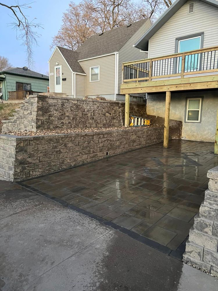 Our Retaining Wall service offers expert design and installation to prevent erosion, protect property, and enhance the aesthetic appeal of your landscape while adding functionality to your outdoor space. for Ramos Universal Landscaping in Sioux Falls, SD