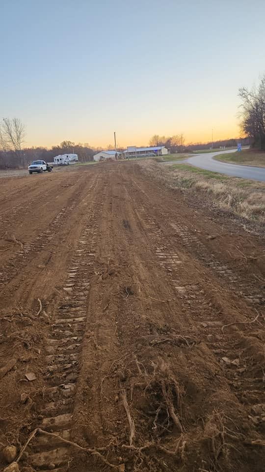 Our Leveling service ensures your land is precisely graded for construction, promoting stability and preventing drainage issues. Trust our experts to create a solid foundation for your next project. for Watkins Excavation in Robards, KY