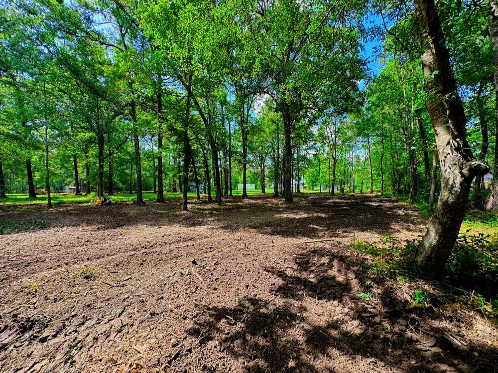 Discover what is land clearing with our Land Grading service, which ensures a level foundation by removing debris and preparing your property for construction or landscaping needs efficiently and professionally. for River Rooted Construction in Loranger, LA