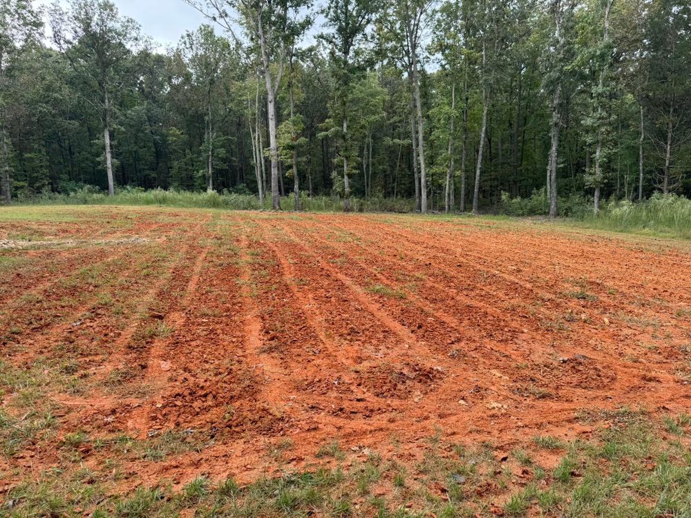 Our Aeration service improves the health of your lawn by allowing air, water, and nutrients to penetrate deep into the soil, resulting in a lush and vibrant yard. for Piedmont Lawn and Landscaping in Lexington, NC