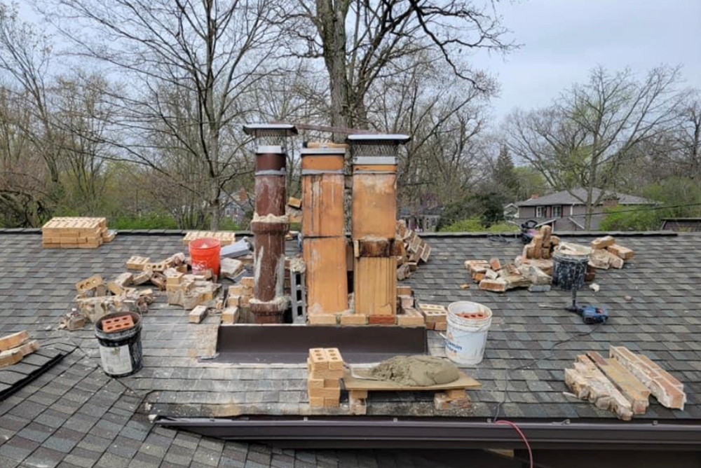 Our Chimney Repairs service provides professional expertise in fixing and restoring chimneys to ensure the safety and functionality of your home's fireplace. for Select Masonry & Roofing in Framingham, MA