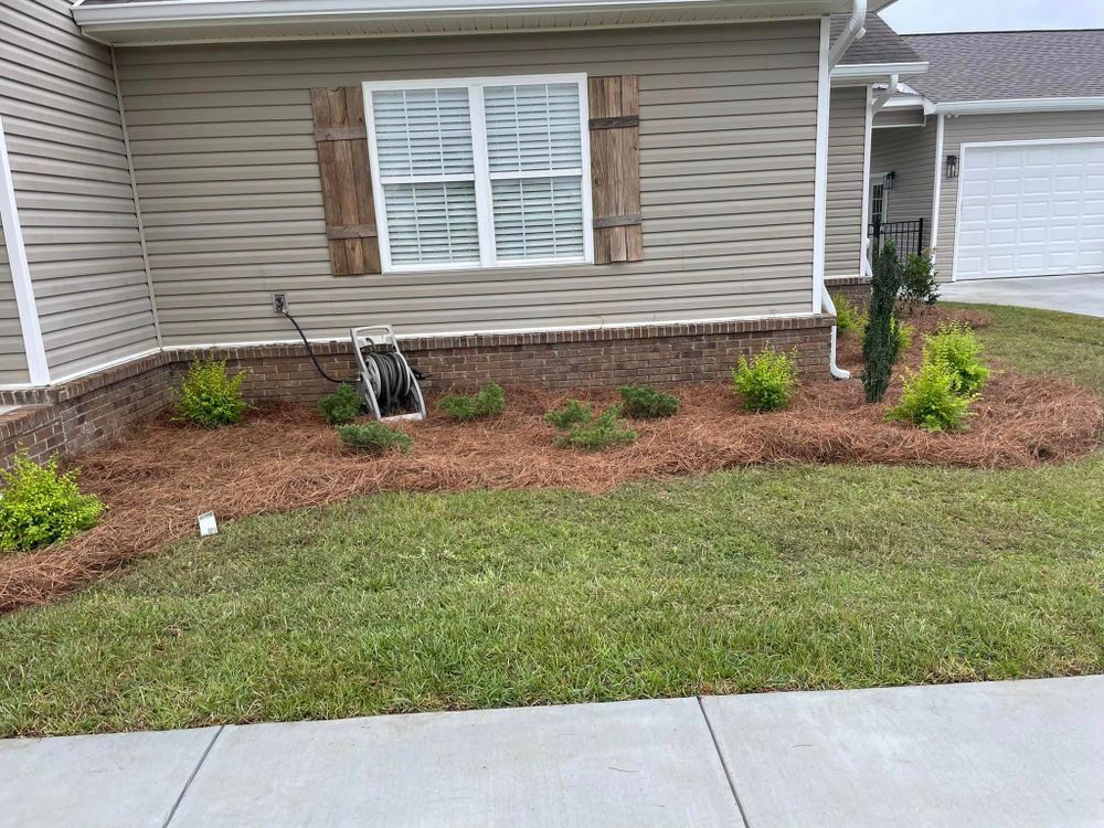 Enhance your garden's aesthetic appeal with our Mulch Installation service. Our team will expertly spread mulch to suppress weeds, retain moisture, and improve soil health for a vibrant landscape. for Jt's Landscaping in Webb, AL