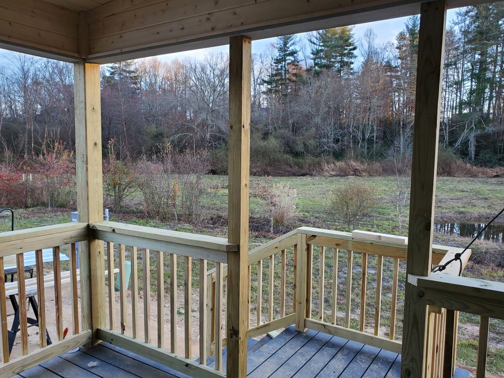 Enhance your outdoor living space with our expert Deck & Patio Installation services, offering custom designs and quality craftsmanship to create a relaxing oasis right in your backyard. for Revitalize Construction in Asheville, NC