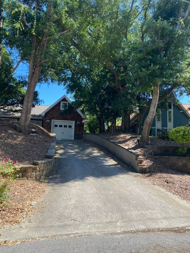 Enhance your home's curb appeal with our professional driveway construction service. We offer durable, stylish designs tailored to fit your landscape perfectly, ensuring quality craftsmanship and increased property value. for JND Transformation Landscapes & Hardscapes LLC in Cedar Point, NC