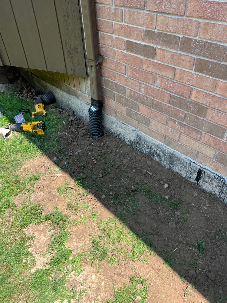 Buried downspouts for Alltimate Outdoor Services in Warren, MI