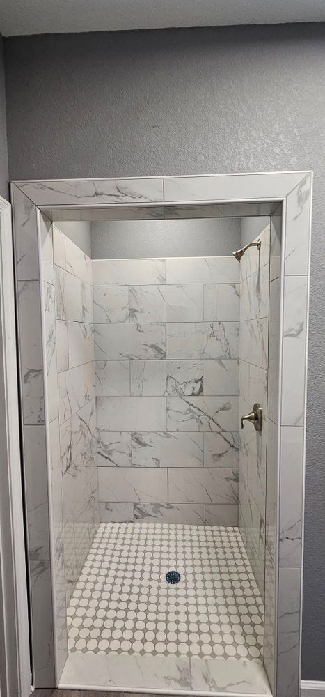 Transform your bathroom into a modern oasis with our expert renovation service. We offer personalized designs, quality craftsmanship, and attention to detail to elevate functionality and style tailored to your needs. for Seaboard Construction & Real Estate Group in Quincy, FL
