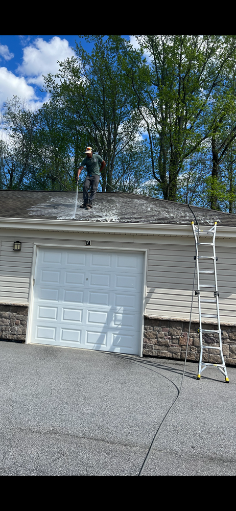 Our Roof Cleaning service is a safe and effective way to clean your roof. We use a soft wash system that will remove any build-up on your roof while protecting the shingles. for Under Pressure: Pressure Washing Service in Raleigh, NC