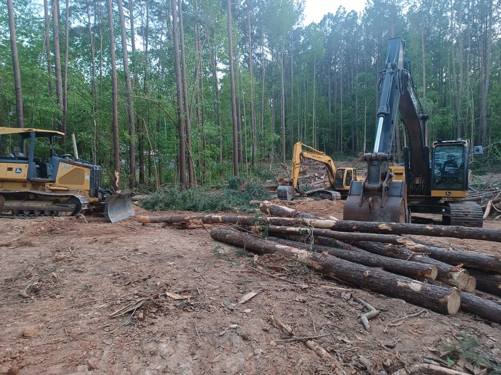 Our Land Clearing service efficiently and safely removes trees, underbrush, and debris from your property to create a clean canvas for landscaping or construction projects. Trust us for expert solutions. for JT Todd Grading in Zebulon, NC