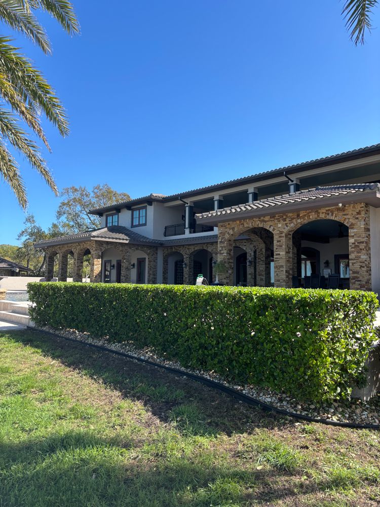 Enhance your home's curb appeal with our expert Shrub Trimming service, ensuring healthy growth and an immaculate look by shaping overgrown shrubs into beautifully manicured, vibrant elements of your landscape. for Vanic's Landscaping in Port Orange, FL