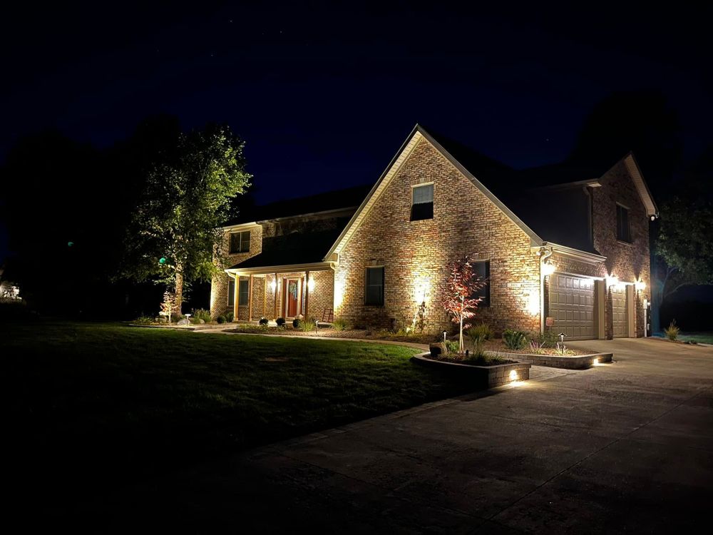 Enhance your home's festive appeal with our professional Christmas lights installation near me, offering seamless, creative designs that transform your exterior into a dazzling winter wonderland effortlessly and safely. for Shaw Landscape and Design in Greenfield, IN
