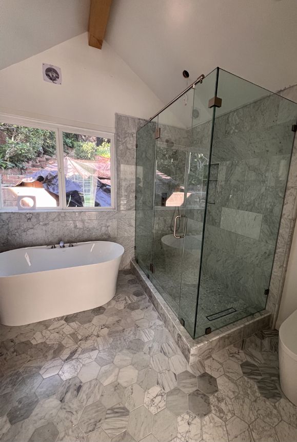 Our expert tiling services provide homeowners with stunning, durable bathroom floors. We offer precise installation, diverse tile options, and professional guidance to transform your bathroom into a stylish and functional space. for Dave Walter Flooring in Santa Clarita, CA