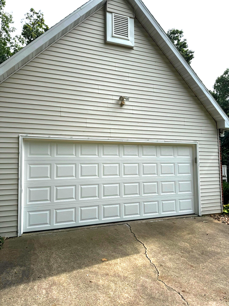 Our Overhead Doors service enhances security and aesthetics for your home. We offer durable, stylish options to improve both the functionality and appearance of your overhead door needs. for Blue Spring Construction in West Plains, MO