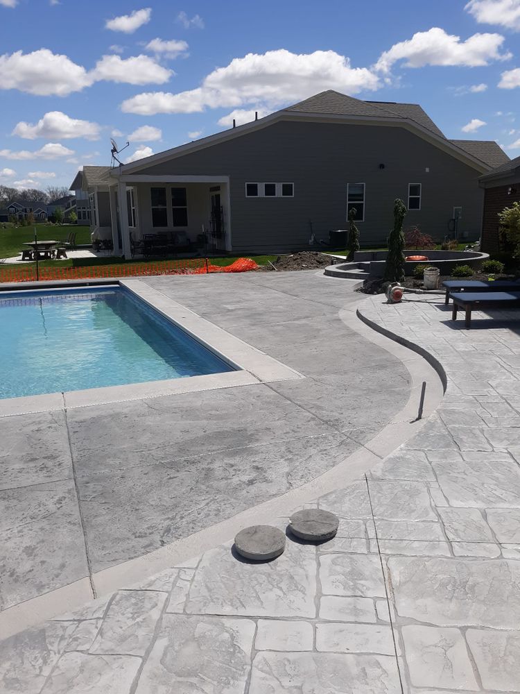 Elevate your outdoor living space with our expert Patio Design & Installation service. Transform your backyard into a stylish, functional oasis with durable and aesthetically pleasing concrete solutions. for Indy Elite Concrete in Arcadia, IN