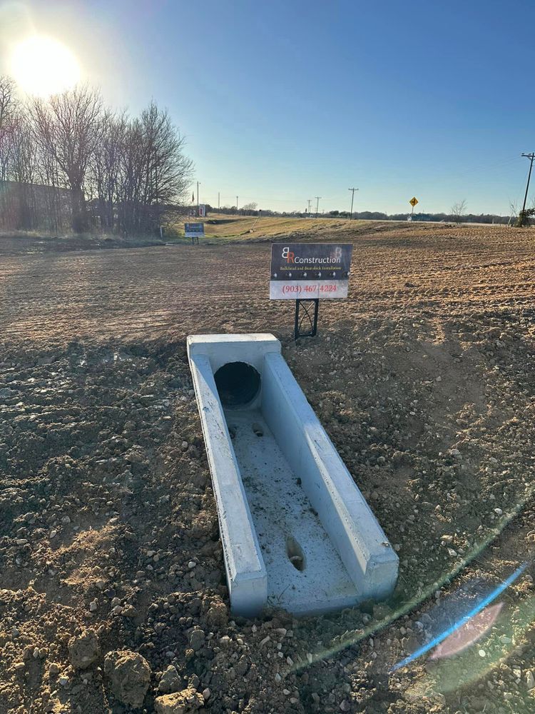 Our Culverts service offers durable and efficient water drainage solutions for your property, ensuring protection from flooding and erosion while maintaining the aesthetic appeal of your landscaping. for BR Construction LLC  in Corsicana, TX