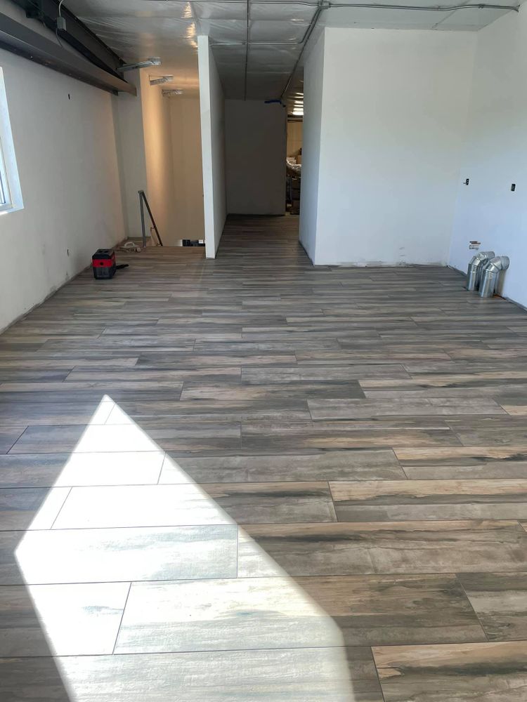 Our expert Flooring service offers homeowners quality installation and materials, transforming any room into a stylish space with durable floors that will stand the test of time. for Fox Construction in Rudd, IA