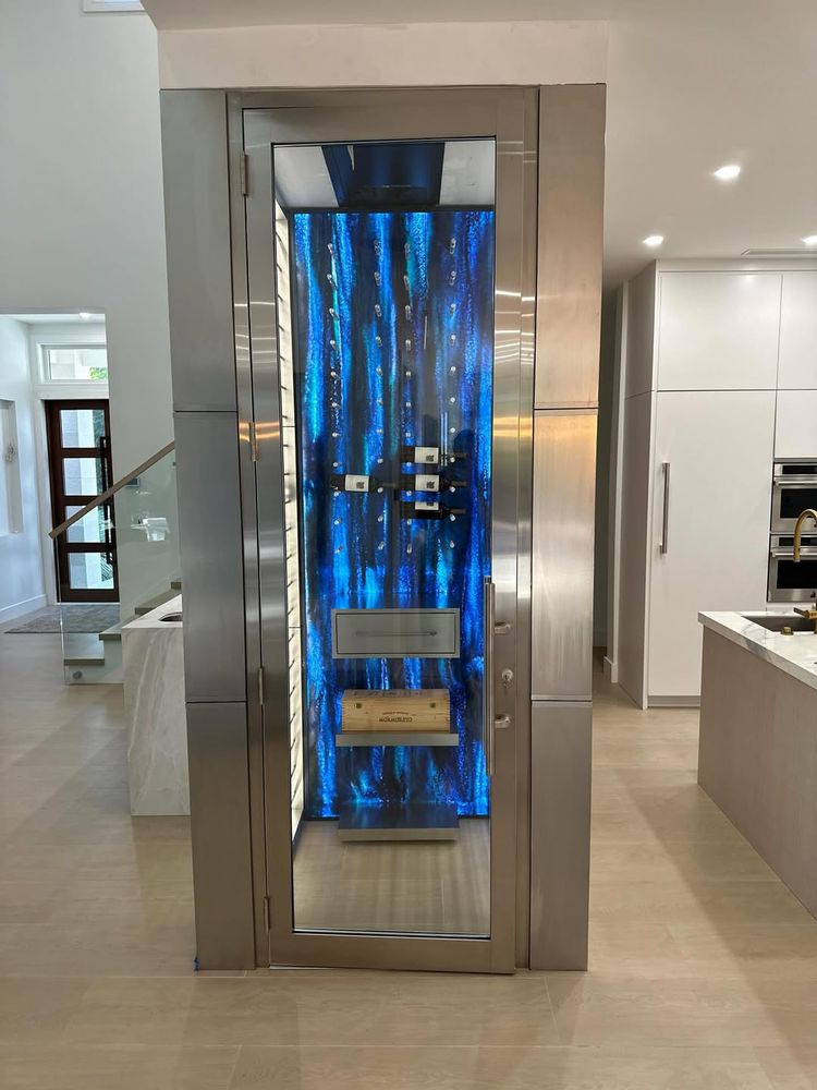 Discover our Glass Wall Systems, designed to enhance your home's aesthetics while maximizing natural light and space. Our expert installations ensure durability, energy efficiency, and seamless indoor-outdoor transitions. for Elite Custom Wine Cellars & More in Palm Beach, FL