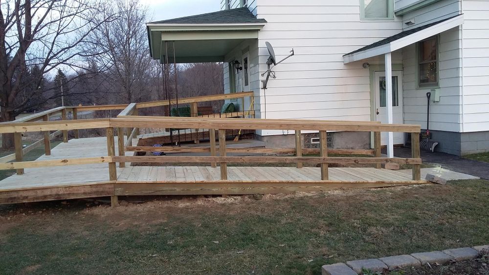 Our deck & patio installation service transforms your outdoor space into a beautiful, functional area, enhancing home value and lifestyle through expert craftsmanship and personalized design tailored to your unique needs. for Otto Construction in Cattaraugus, NY