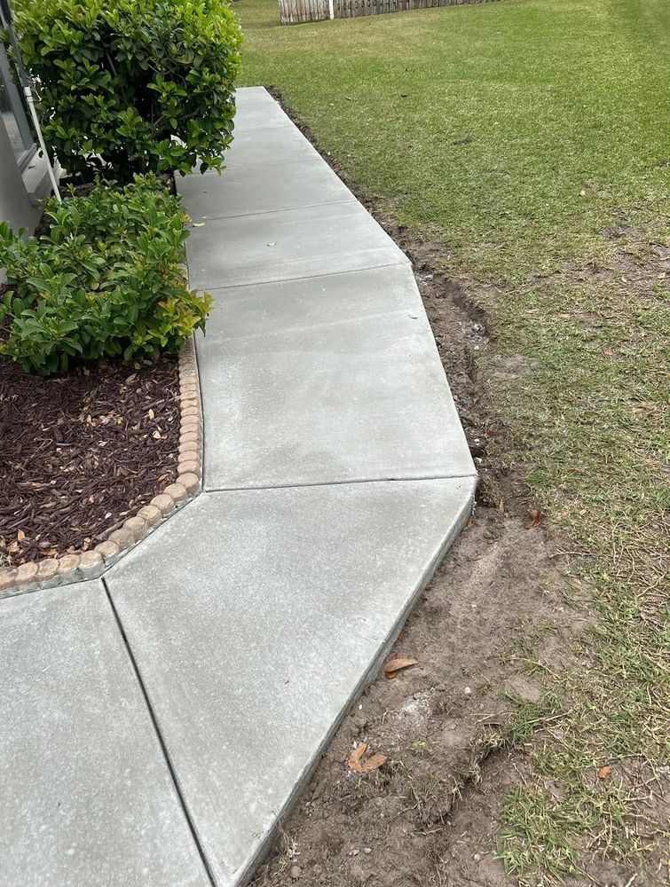 Transform your home with our expert Sidewalk Installation service, ensuring durability and aesthetic appeal. Our skilled team delivers precision-crafted concrete walkways that enhance safety and elevate your property's curb appeal. for Brooke’s Masonry & Services in Apollo Beach, FL