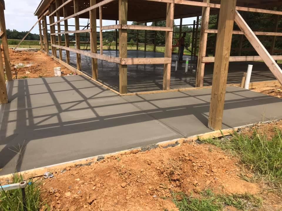 Our Concrete service offers durable and stylish options for your home's exterior, providing long-lasting solutions that enhance curb appeal and protect your property with professional installation expertise. for Henry & Son Painting in Hazel, KY