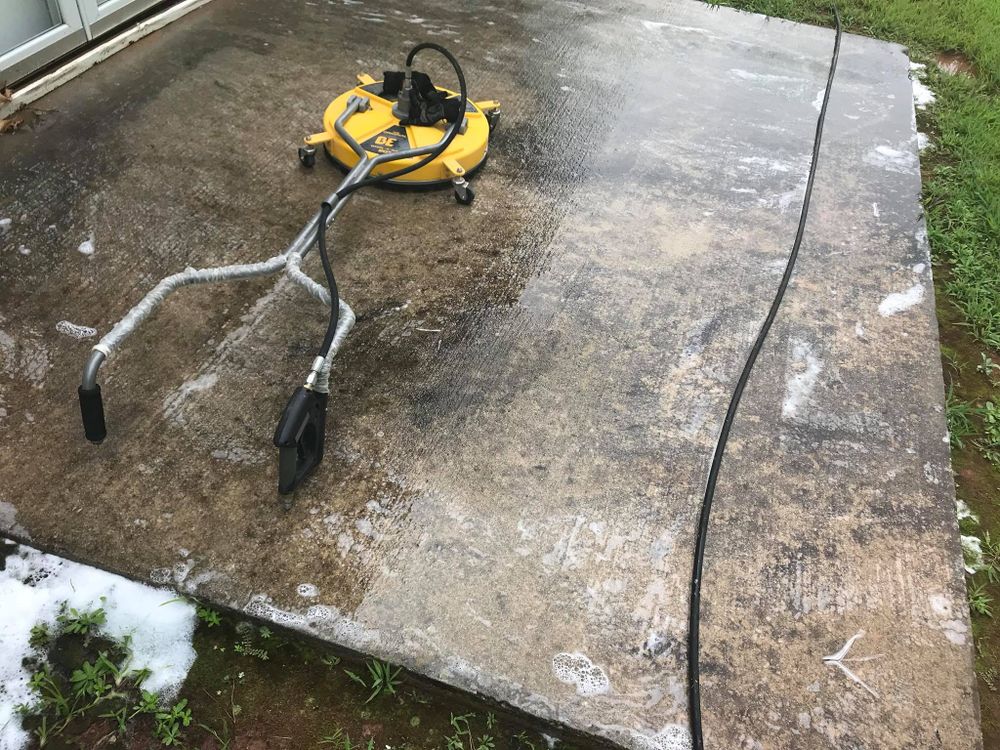 Our Pressure Washing service helps homeowners keep their property clean and well-maintained by removing dirt, grime, and stains from surfaces such as driveways, decks, and fences. for A-1 Lawn Care in Lithonia, GA