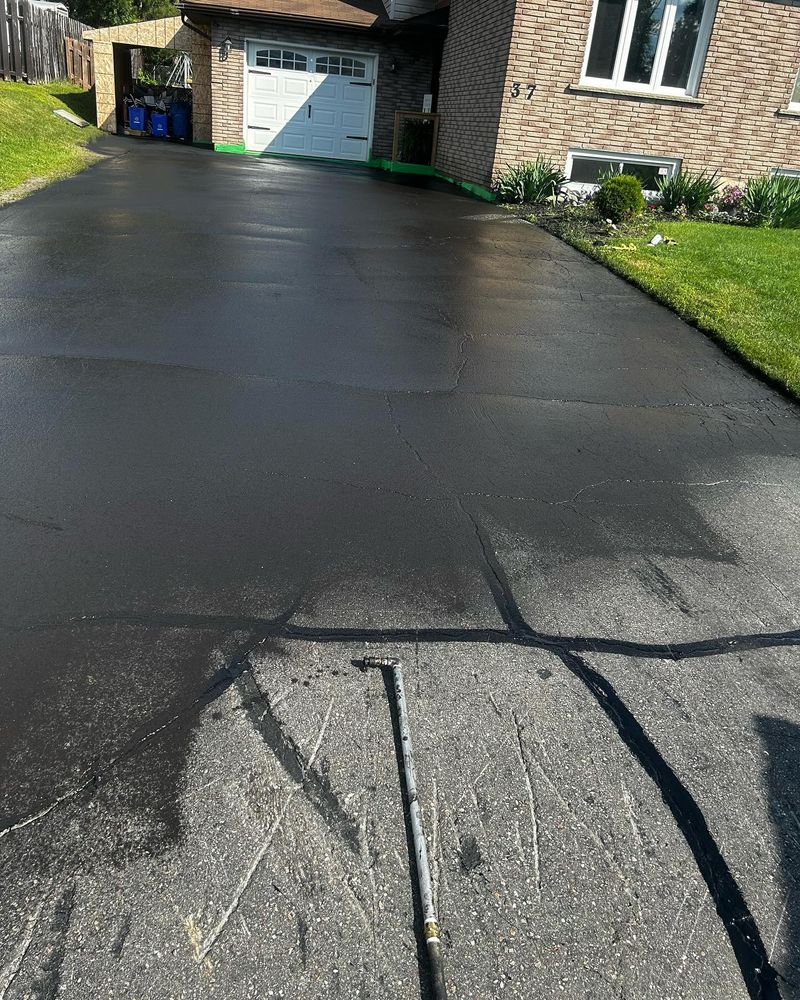 we provide expert asphalt pothole and crack repair in Sudbury to restore your driveway or parking lot and prevent costly future damage. Fast, professional service that extends the life of your asphalt. for Signature Property Care Inc. in Greater Sudbury, ON