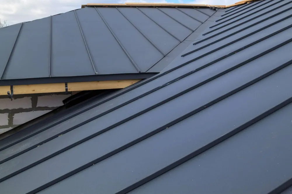 Our roofing installation service offers top-quality metal roofs that combine durability, energy efficiency, and aesthetic appeal, ensuring your home is well-protected and visually stunning for years to come. for Dollar Roofing & Gutters in Jeffersonville, GA