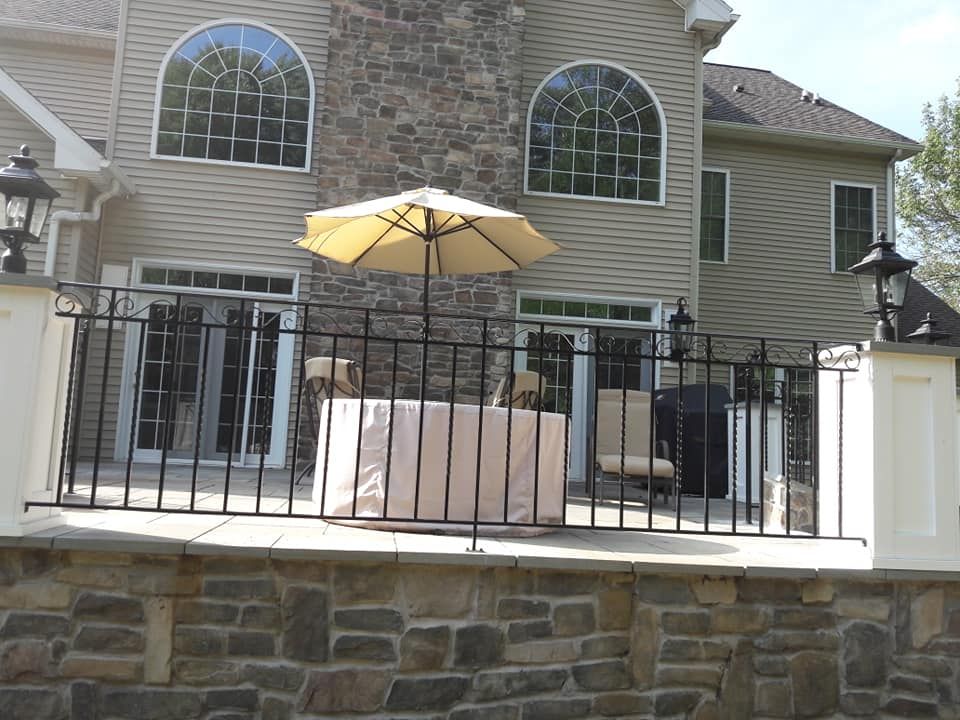 Our Patio Design & Installation service offers homeowners expertly crafted outdoor living spaces to enhance their property, providing a beautiful and functional area for relaxation and entertainment. for Frank iron works inc in Philadelphia,, PA