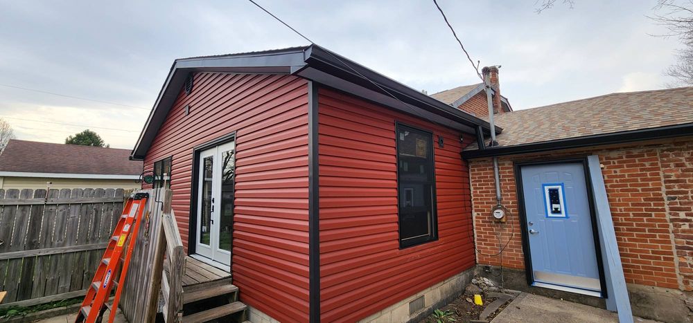 Enhance your home's exterior with our expert siding services, offering durable and stylish options that improve insulation, increase curb appeal, and protect against weather elements for lasting beauty and performance. for Valley Vision Construction LLC in Troy, OH