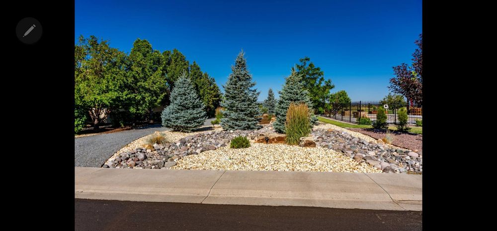 Enhance your garden's beauty and health with our professional mulch installation service, designed to retain moisture, suppress weeds, and enrich soil efficiently for vibrant landscaping all year round. for Double A Home & Lawn Services in Montrose, CO