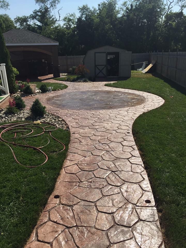 Transform your outdoor space with our expert stamped concrete installation, offering beautiful, durable surfaces that mimic natural stone at a fraction of the cost. Enhance your home’s curb appeal effortlessly. for Unique Concrete LLC in Bridgeton, NJ