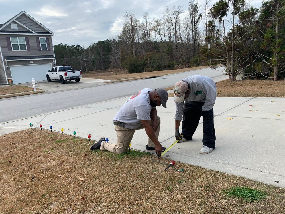 Mowing for All in One Landscaping in Jacksonville, NC