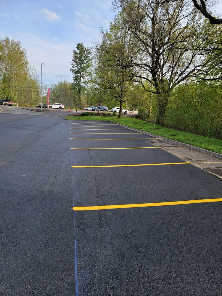Our Asphalt Striping service creates clean, durable parking and driveway markings that improve safety, traffic flow, and curb appeal. We use precise layouts and long-lasting paint for professional results. for Joles Construction in Newberg, OR