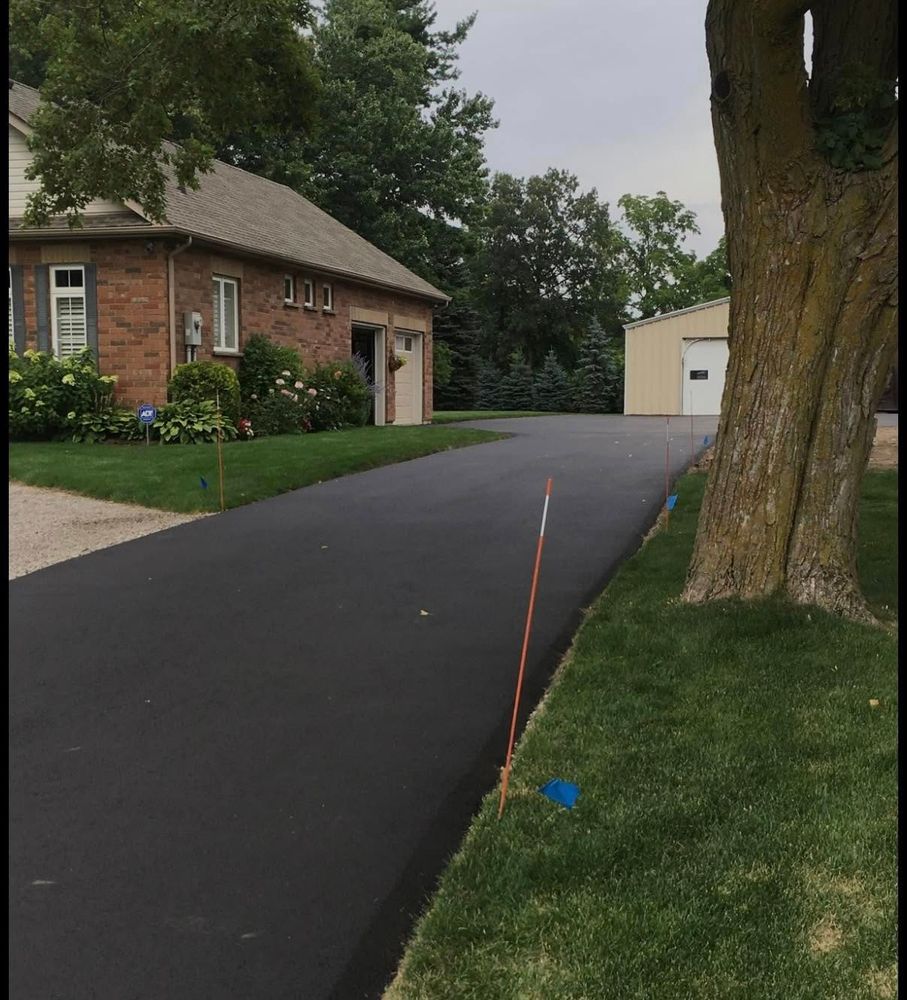 Our Asphalt Maintenance service ensures longevity and durability for your driveway by providing crack sealing, pothole repairs, and protective sealcoating to prevent damage from weather and daily wear. for Pavesheild in Haines City, FL