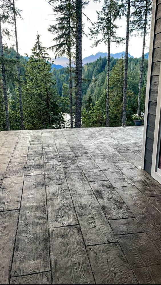 We offer stamped concrete installation to enhance your home's aesthetic appeal with customizable patterns and colors, providing a durable and cost-effective alternative to traditional materials like brick or stone. for MC concrete in Shelton, WA