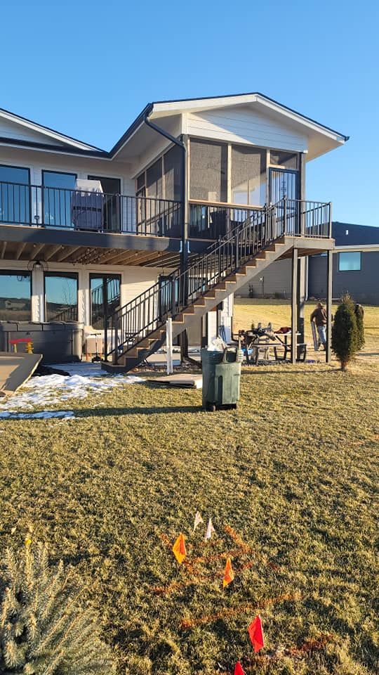 Transform your outdoor space with our professional Deck & Patio Installation service. Our experienced team will work closely with you to create a beautiful and functional area for relaxation and entertainment. for Kustom Home Improvements in New Virginia,,  IA