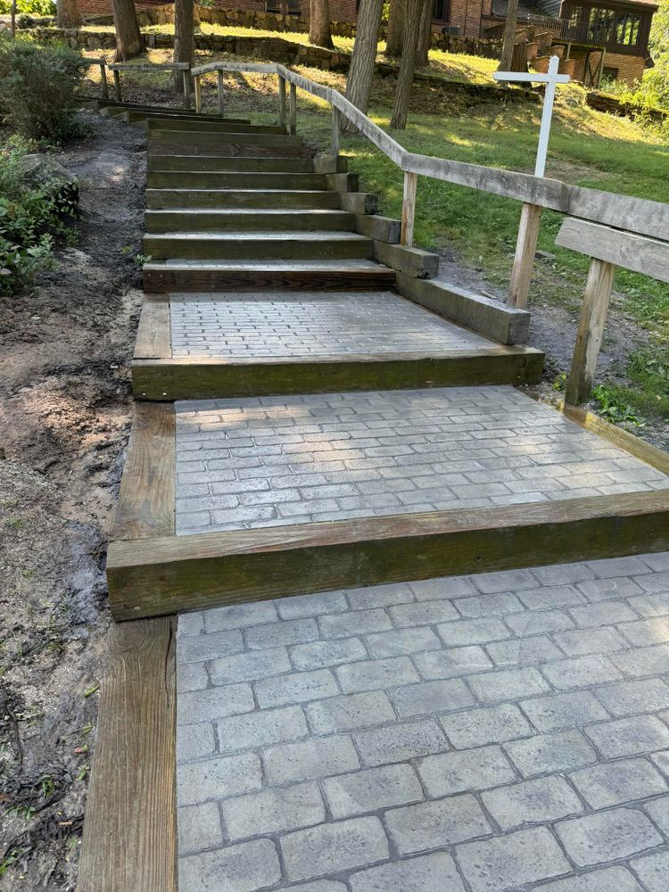 Enhance your home with our expert stair design and installation service, offering durable and stylish concrete stairs that blend functionality with aesthetic appeal. Our team ensures seamless integration in any space. for B & E Concrete in Michigan City, IN