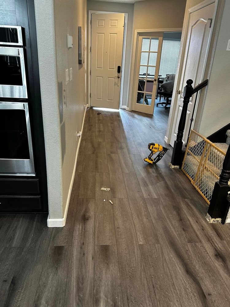 Our Flooring service provides homeowners with top-quality flooring options and installation services to enhance the aesthetics and functionality of their homes. for Conquer Painting & More in Albuquerque, NM