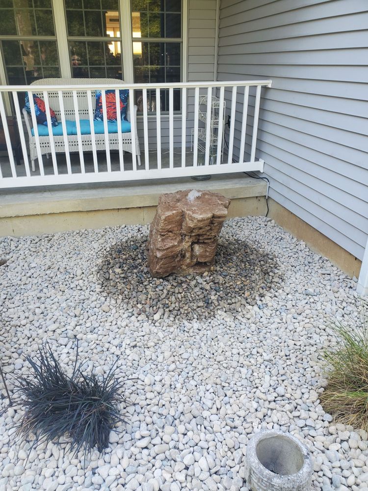Enhance your garden's beauty and health with our professional mulch installation service, designed to retain moisture, suppress weeds, and add aesthetic appeal to your landscape through expertly crafted rock beds. for Wolfe Custom Landscaping in Milford, OH