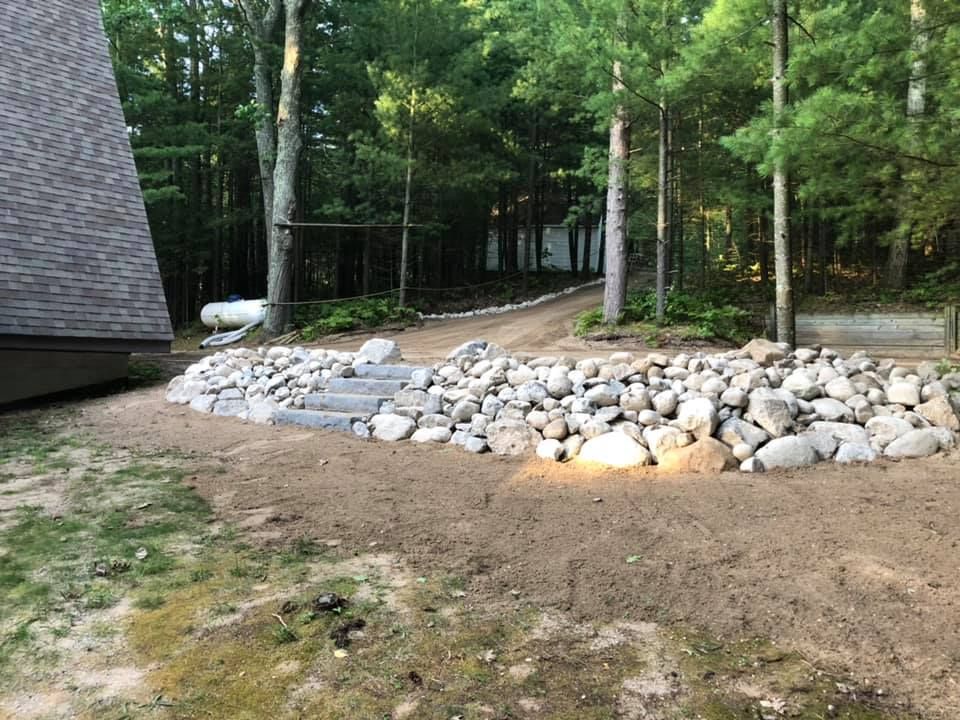 Our Driveway Design & Build service offers expert planning and construction of durable driveways, ensuring a stunning entrance to your home that enhances both curb appeal and functionality. for NC Dirt Works in Kingsley, MI