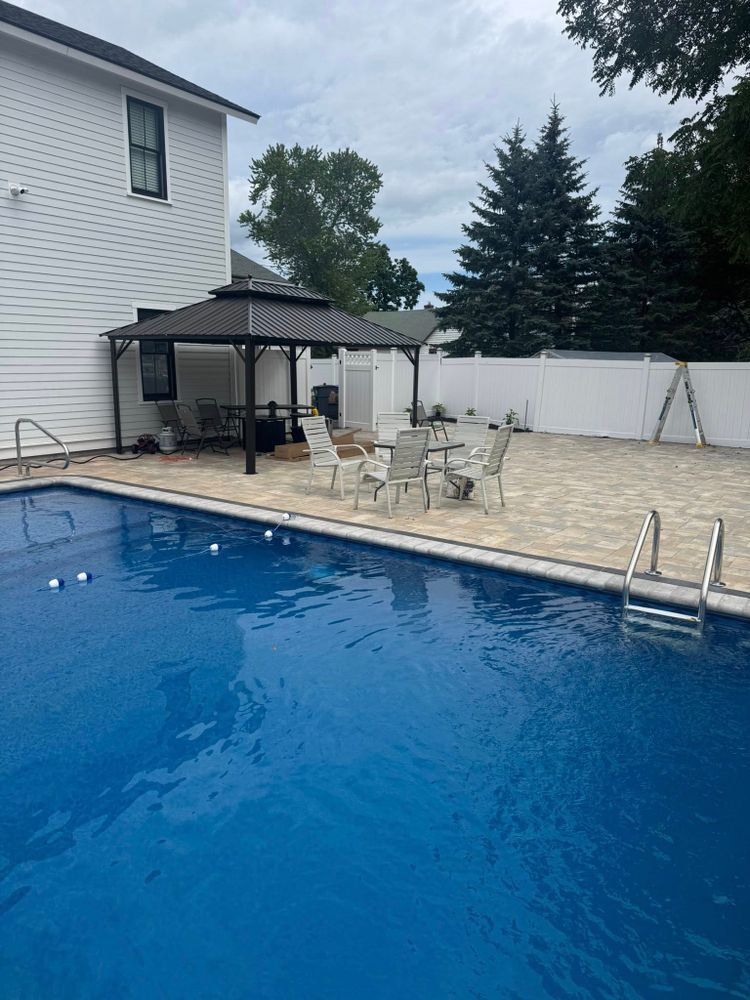 Transform your outdoor space with our expert Patio Construction service, combining durability and elegance to create a beautiful, functional area perfect for relaxation and entertainment in your own backyard. for Pools, Patios, Perfection. We Build It All. in Boston, MA