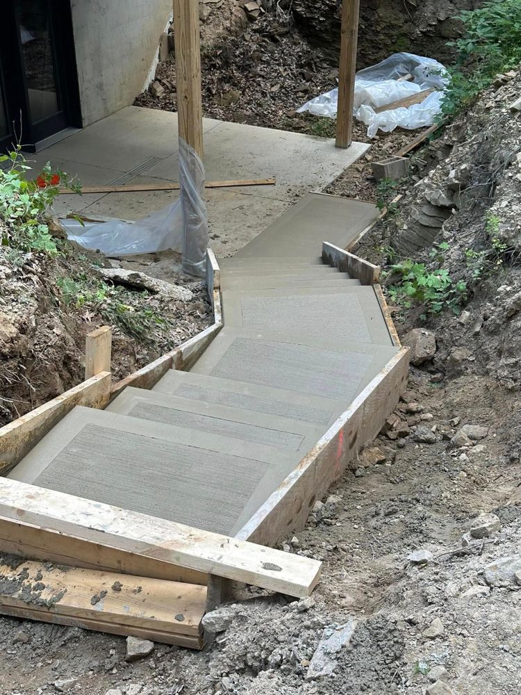 Enhance your home's elegance with our expert stair design and installation service. We craft durable, stylish concrete stairs tailored to your vision, ensuring a seamless blend of functionality and aesthetics. for Concrete Pros, LLC in Lorain, OH
